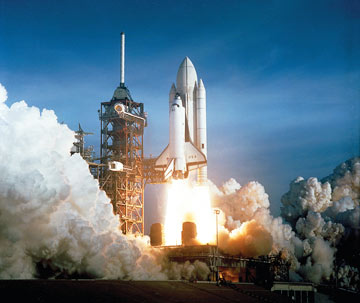Space shuttle lifting off