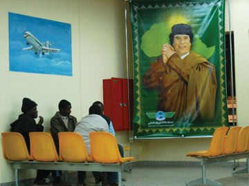 Picture in airport of Libyan leader Colonel Muammar al-Qaddafi