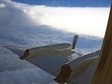 View out the window of a hurricane hunting airplane