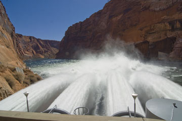 Water pouring through Glen Canyon Dam and down the Colorado River