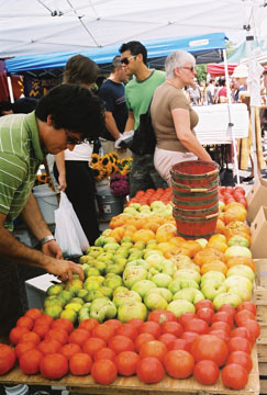 Person buying food at a farmer's market